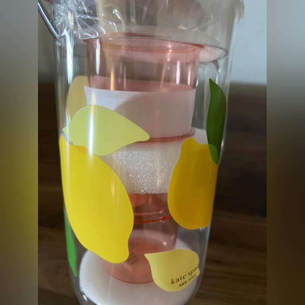 Kate Spade Plastic pitcher and cups.